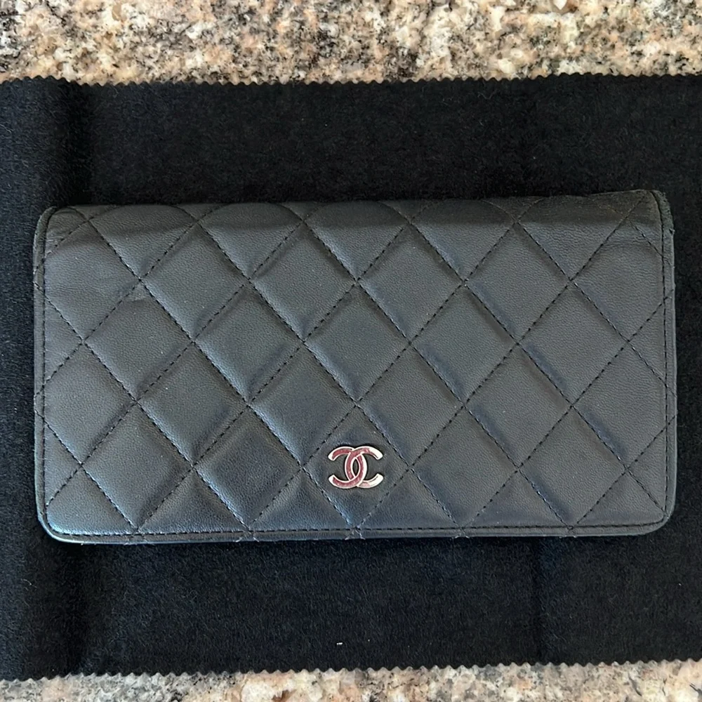 CHANEL Black Quilted Leather Wallet on Chain with Silver-Tone Hardware